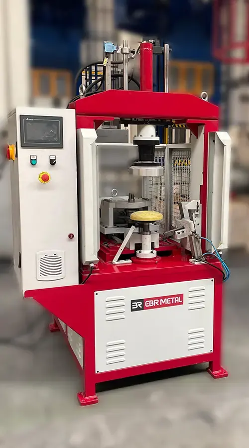 Hydraulic trimming and flanging machine for stainless steel boiler heads