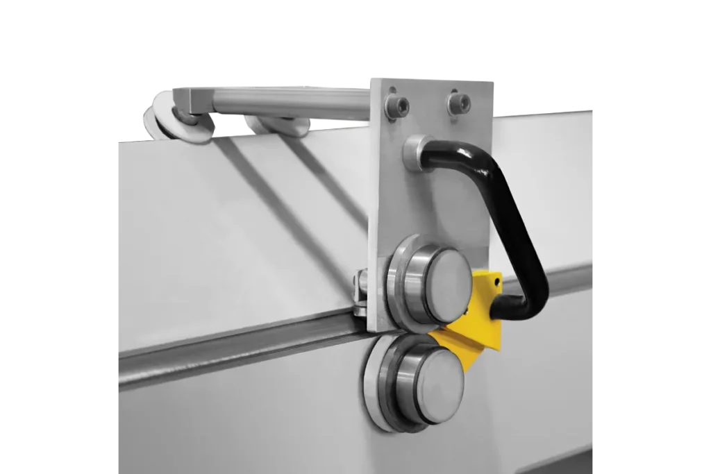 Slitting attachment detail on a CMK manual folding machine