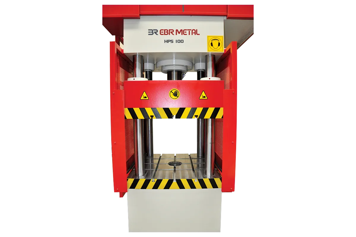 Front view of the HPS 100 with four guide columns and T-slot table.