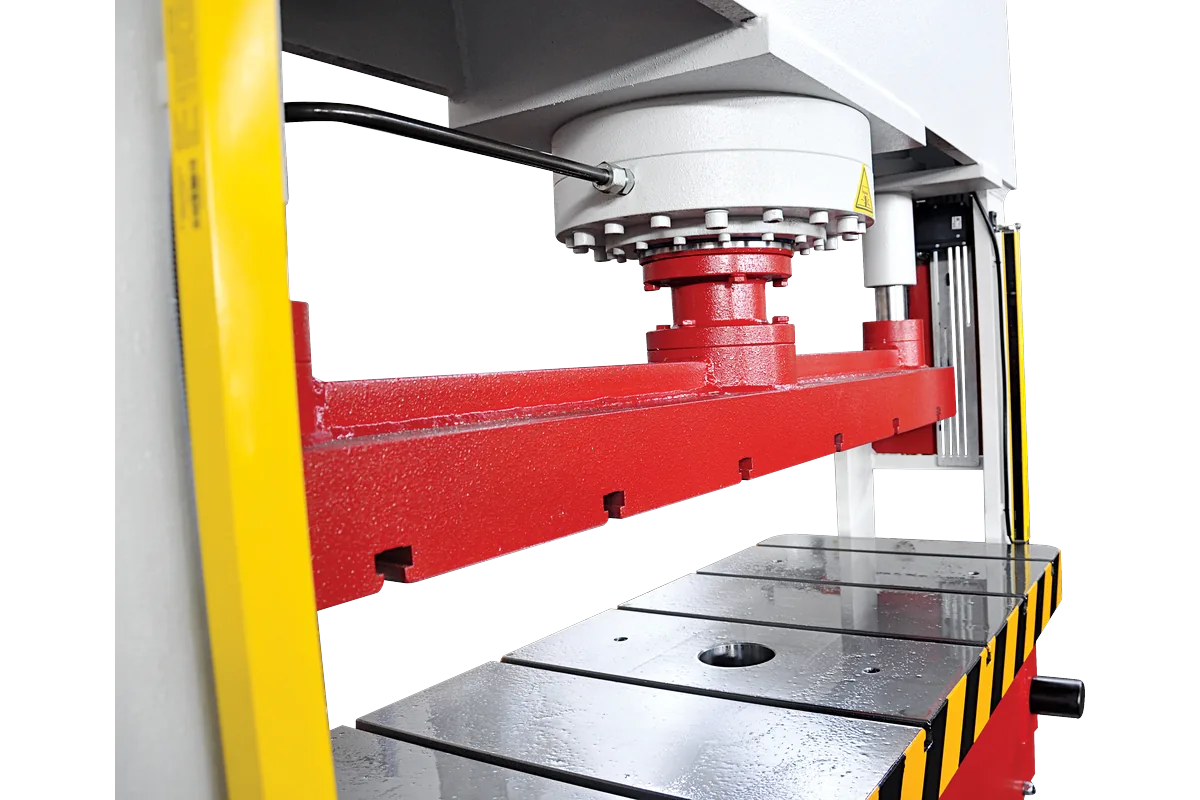 Ram, guide piston and T-slot bottom table of an HPT press.