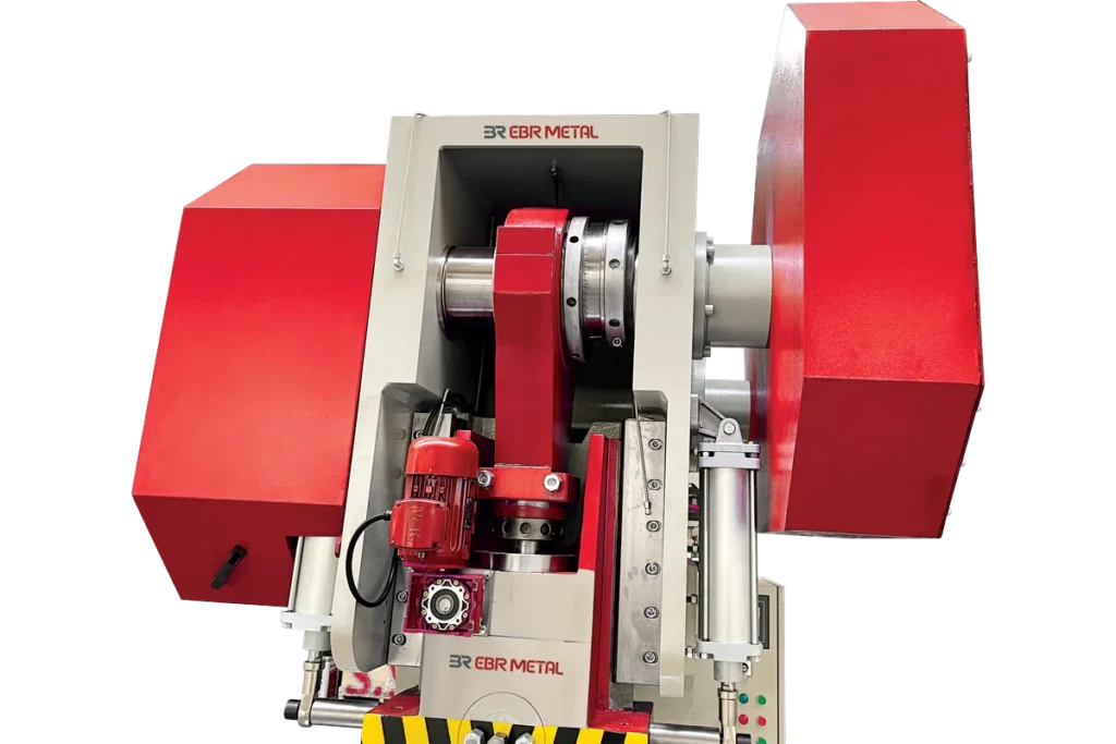 Drive mechanism and flywheel guard at the top of an MPC press.