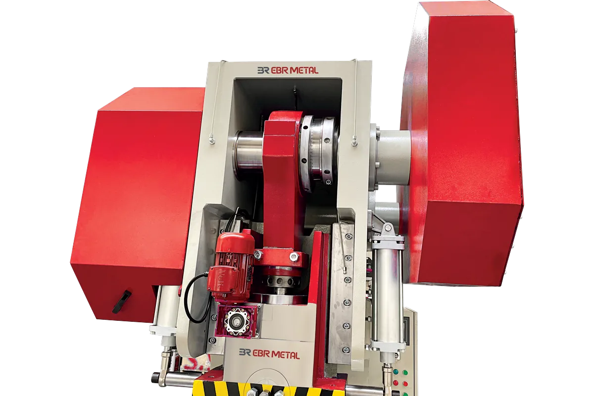 Drive mechanism and flywheel guard at the top of an MPC press.
