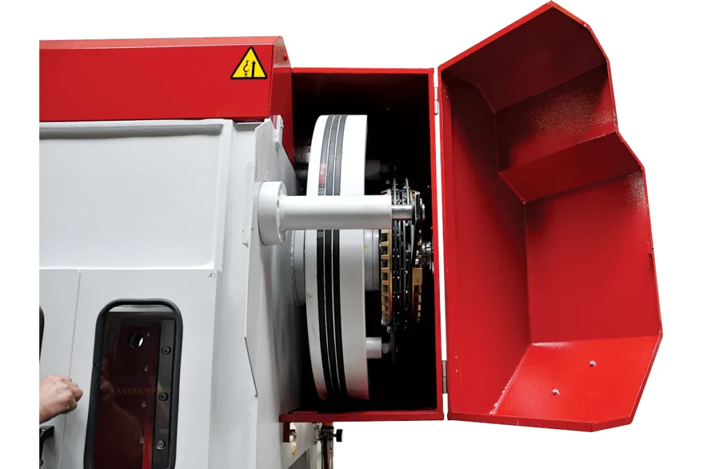 Clutch-brake unit behind the opened guard of an MPH press.