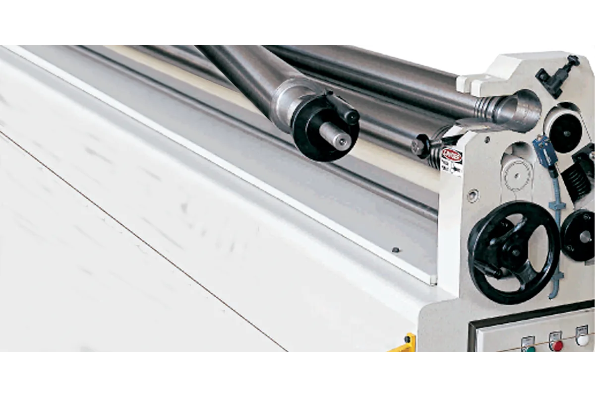 Manual drop-end on an MRM asymmetrical 3-roll plate bending machine.