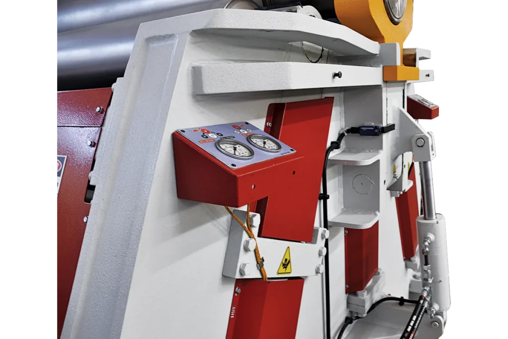 Pressure gauges on the side frame of a 4V HMK plate bending machine.