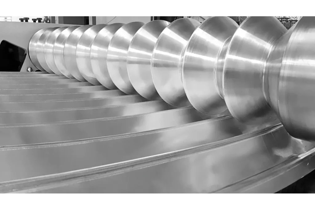 Grooved rolls of a 4V HMR plate bending machine.