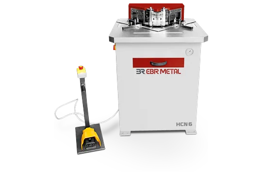 HCN 6 hydraulic corner notching machine with fixed 90° blades and foot pedal.