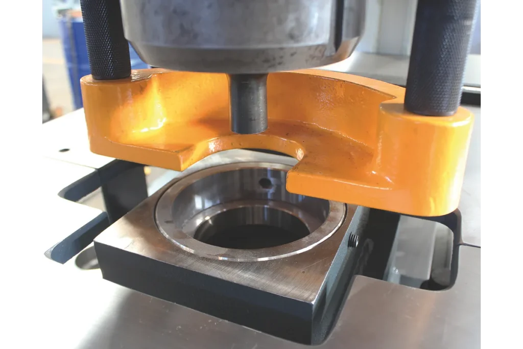 Large round die on the HSW punching station.